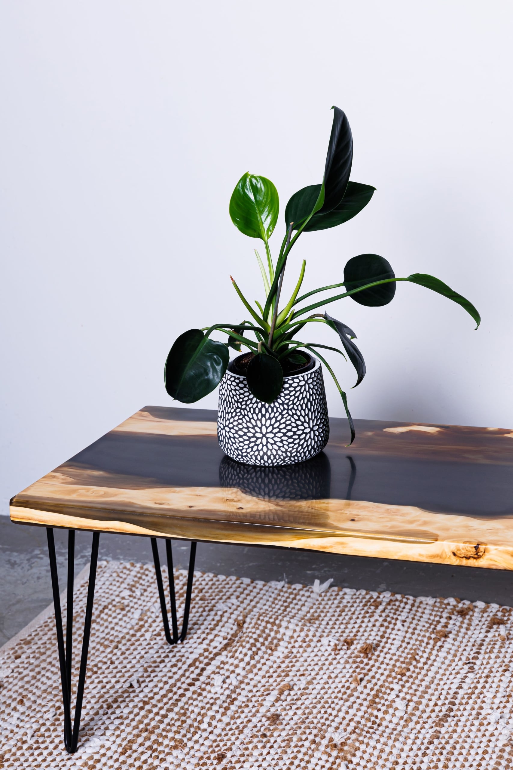 Swamp kauri side table with black resin and hairpin legs