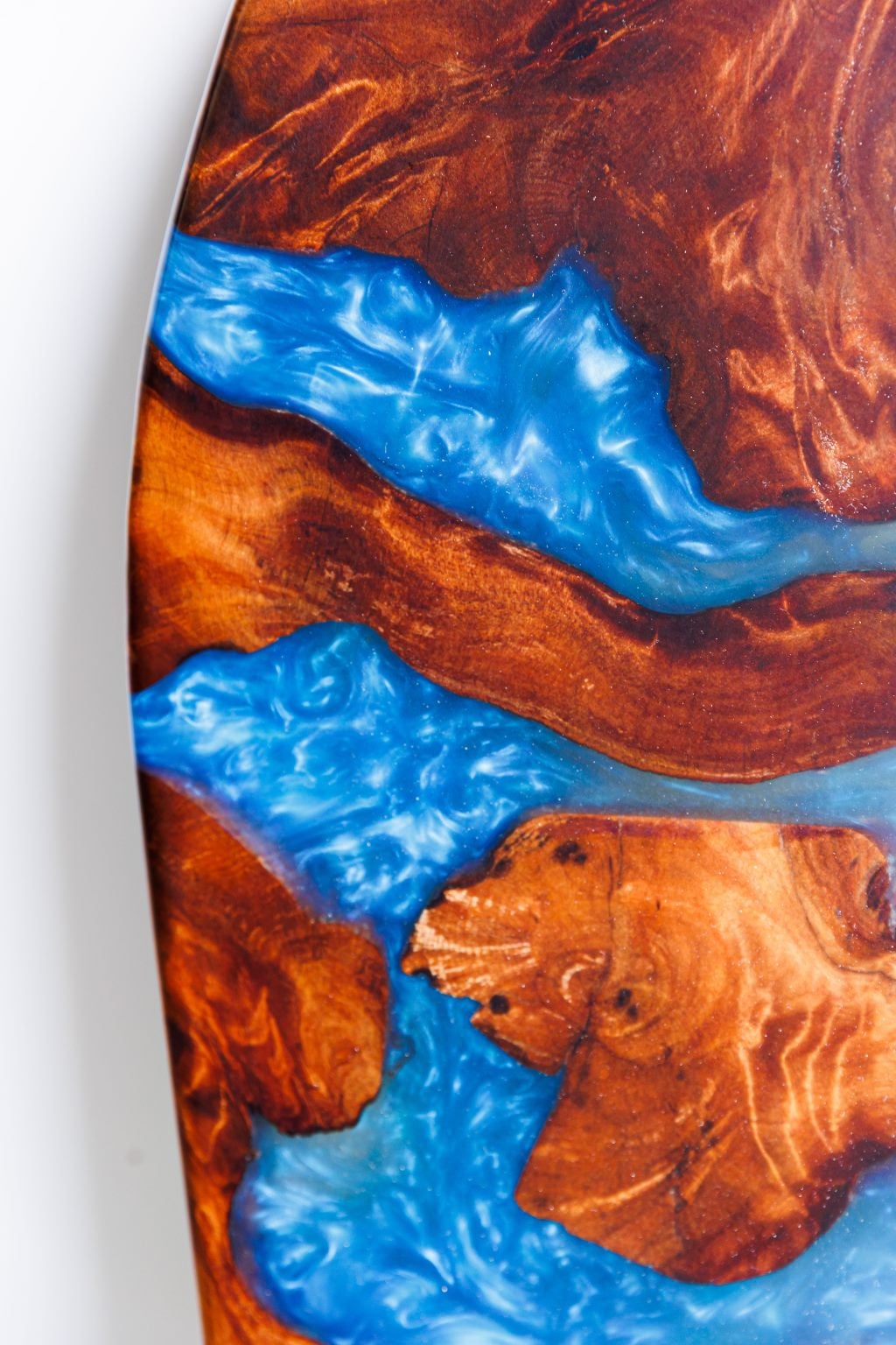 Swamp kauri coffee table top with blue glitter resin