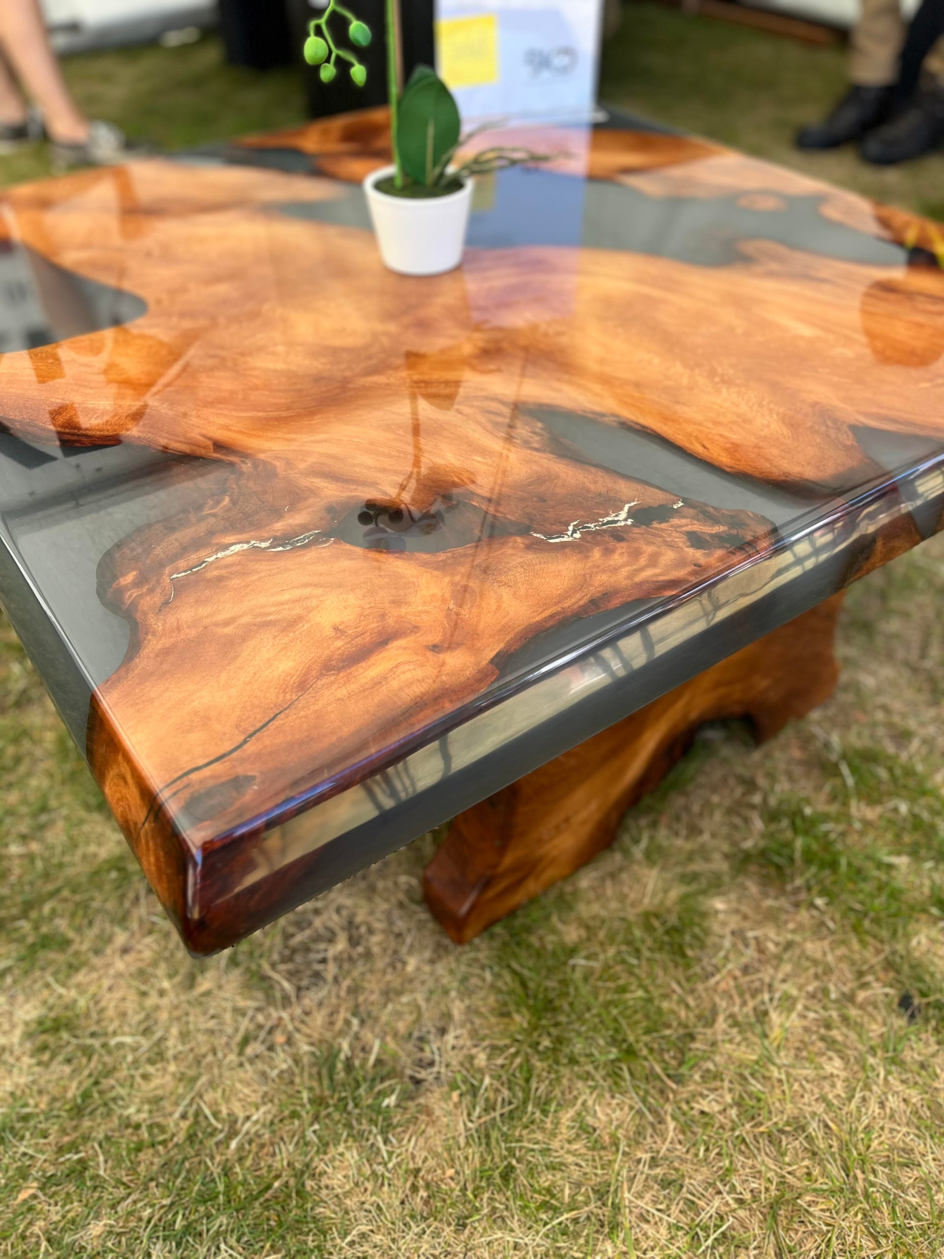 Swamp kauri and grey resin coffee table on a kauri base